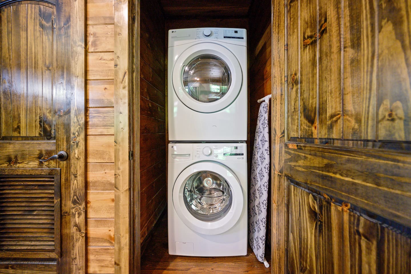 Fully equipped laundry room with washer, dryer, and extra linens, making longer stays convenient and stress-free.