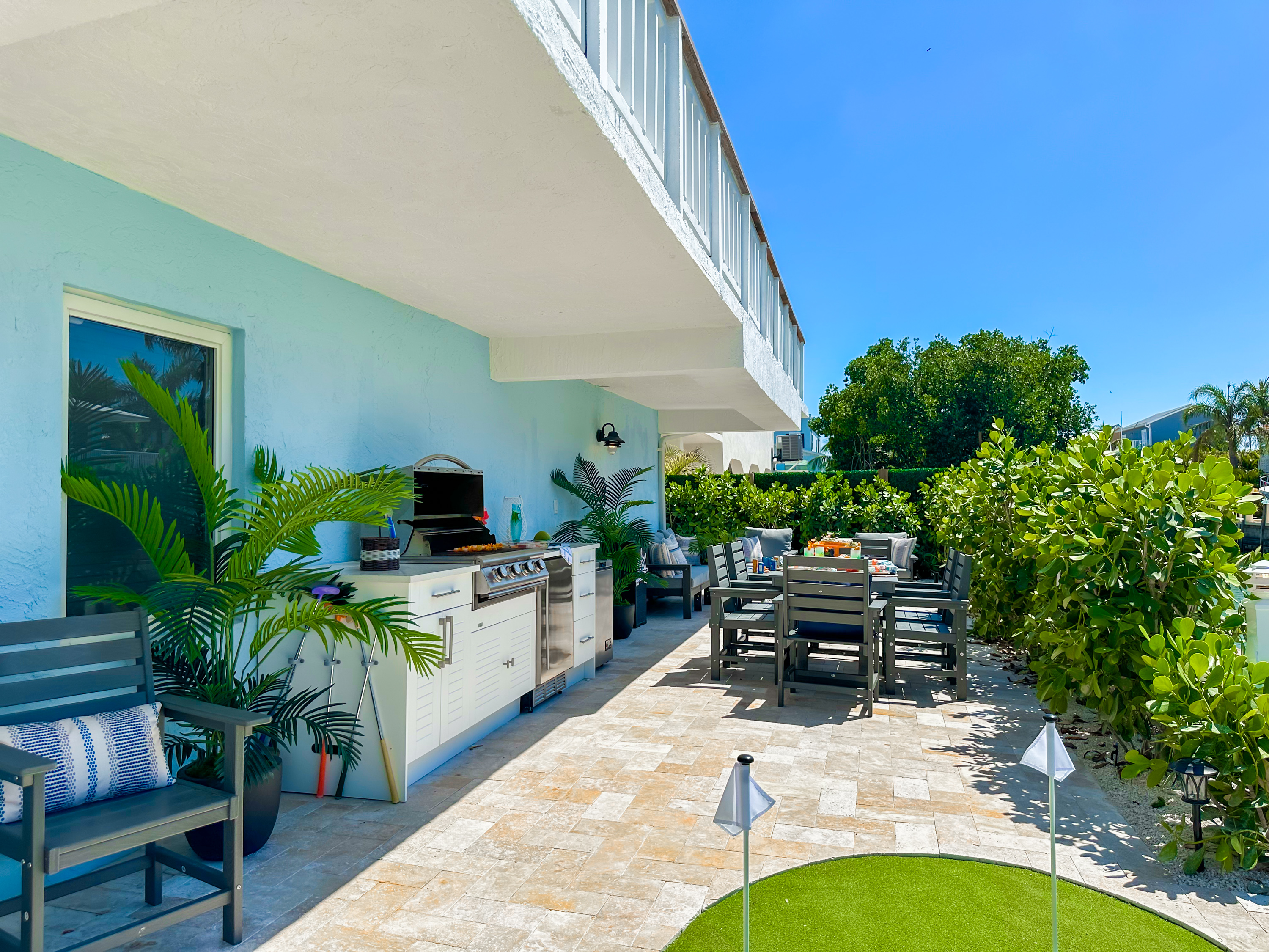 Around the corner, by the canal, is the BBQ area.