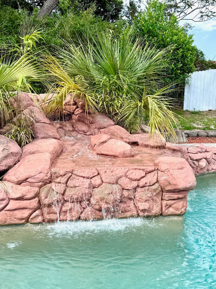 Enjoy the waterfall in the pool or just to hear the calming sound of the water while you sit back and relax
