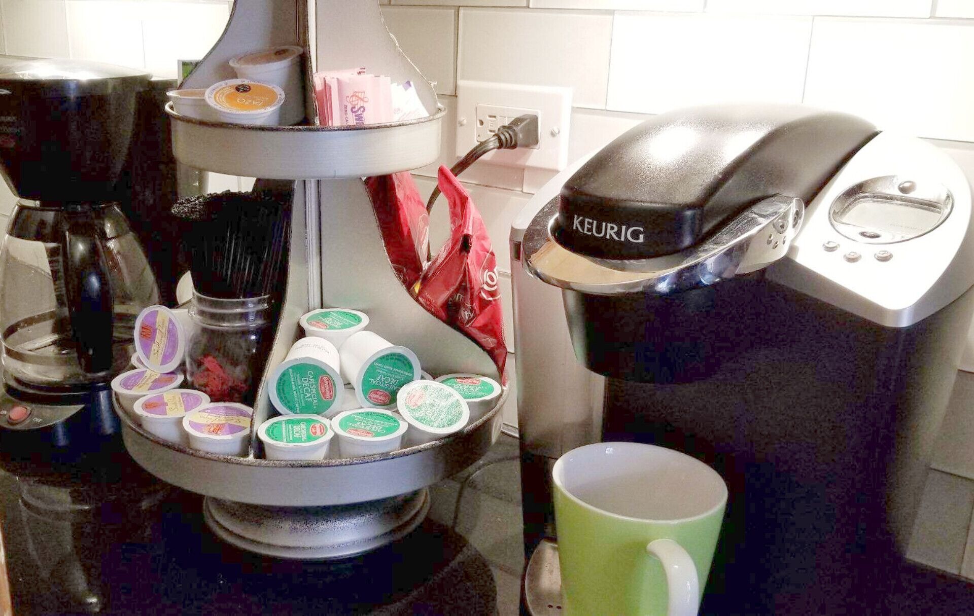 COFFEE BAR W/KEURIG AND FULL POT BREWING. COFFEE, CREAMERS, PODS PROVIDED.