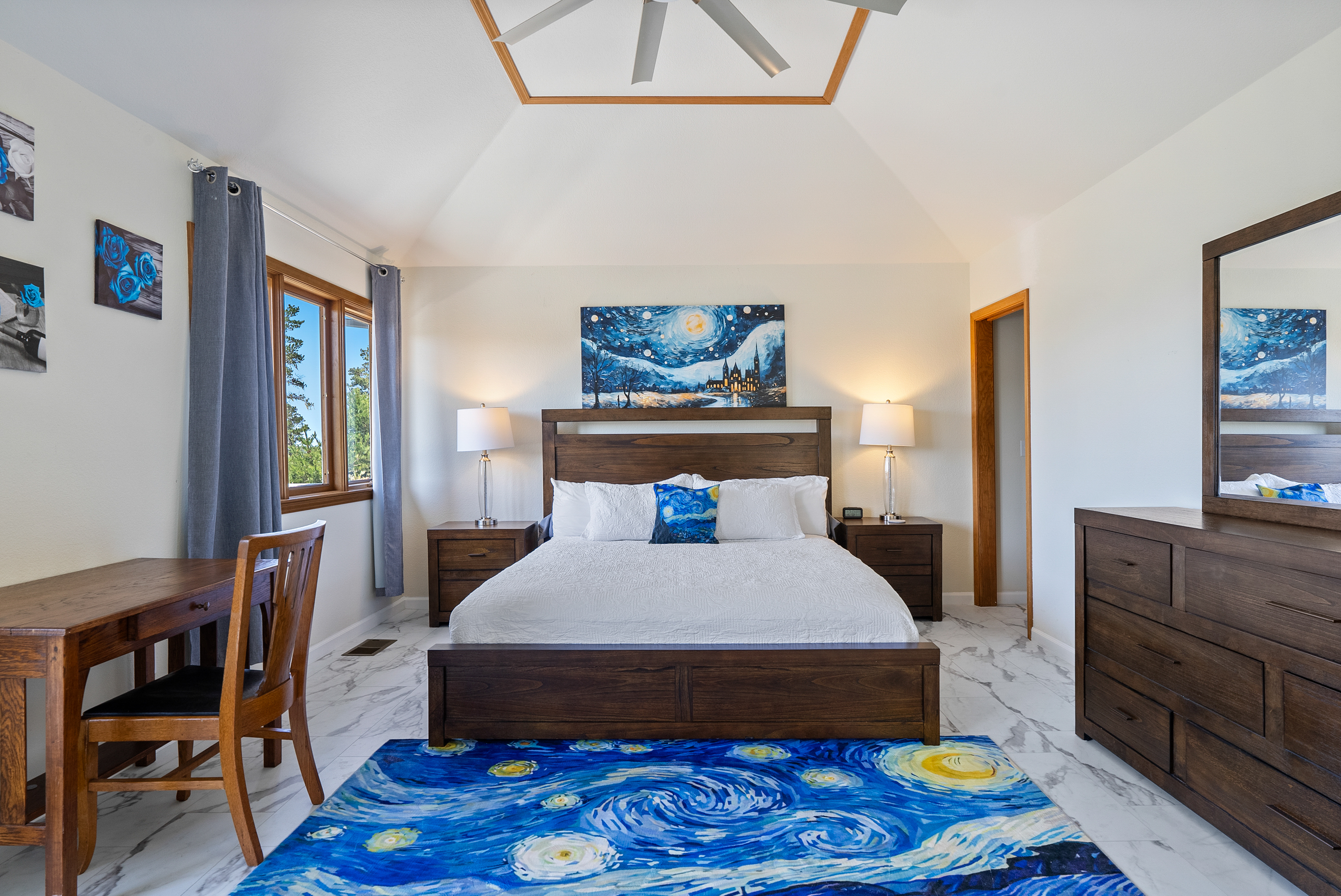 Dreamy ensuite retreat with plush bedding for ultimate comfort.