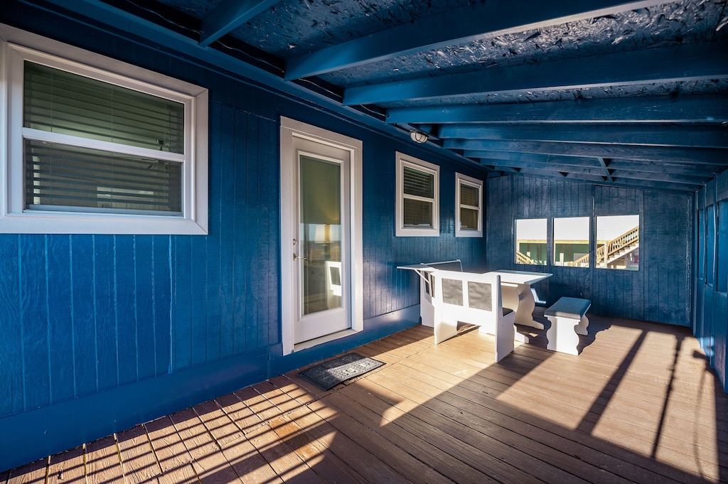 Screened in porch facing Sargent Beach.. perfect place for morning coffee or an evening cocktail!