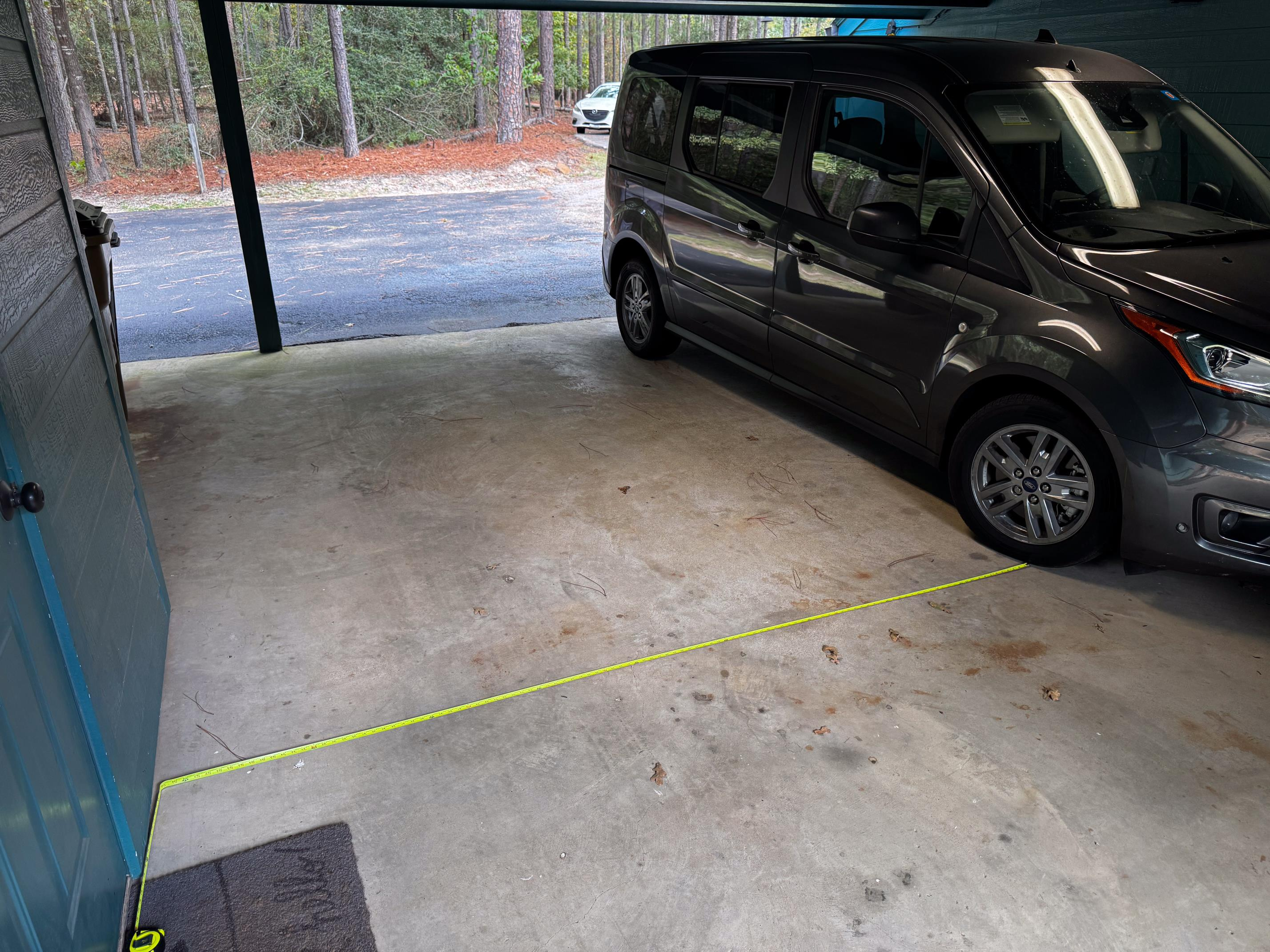 2 vehicles can park in the carport.