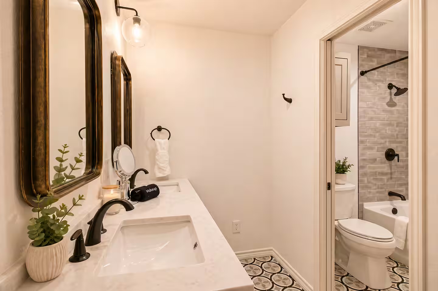 Modern bathroom with clean finishes and bathtub shower combo