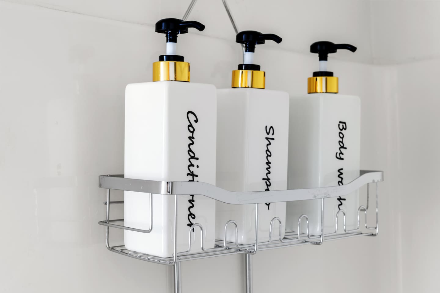 Spa-style shower essentials: enjoy complimentary shampoo, conditioner, and body wash in sleek, refillable dispensers.