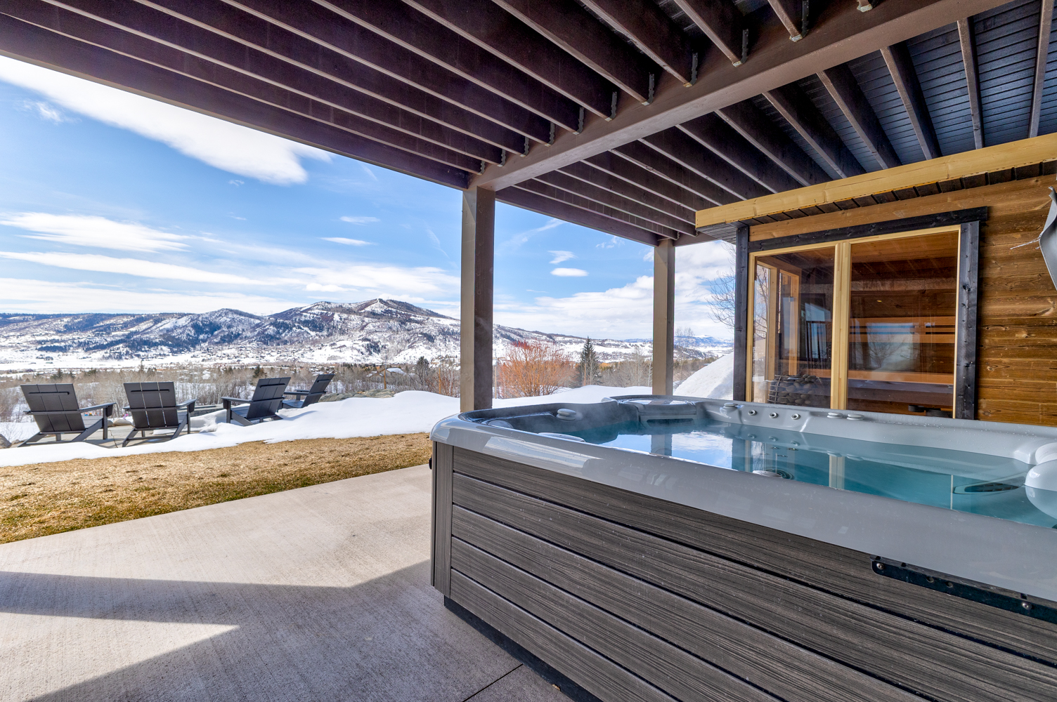 Lower Level Deck View- Hot Tub & Sauna