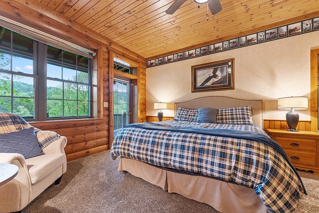Main level bedroom with king bed