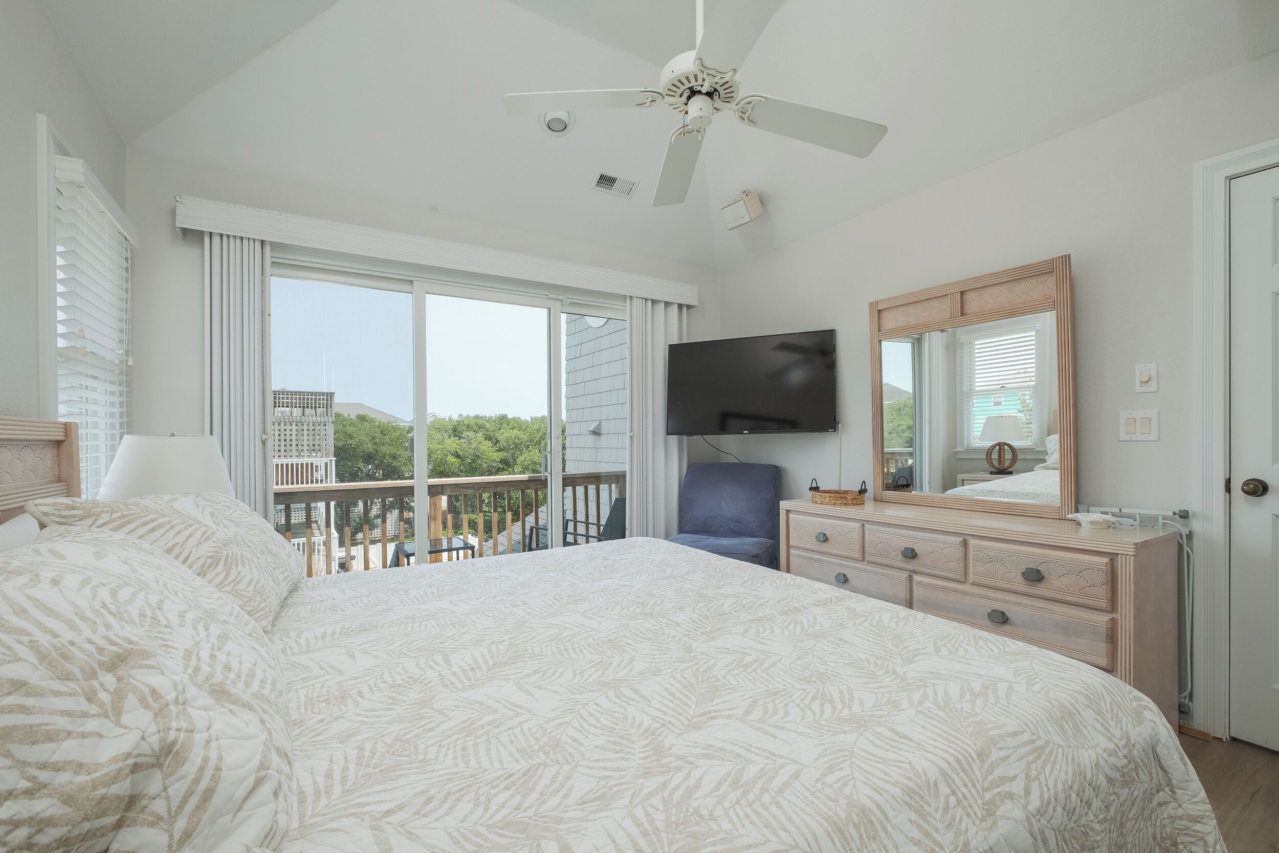 Relax in this 3rd Floor King Bedroom with a Smart TV and dresser.