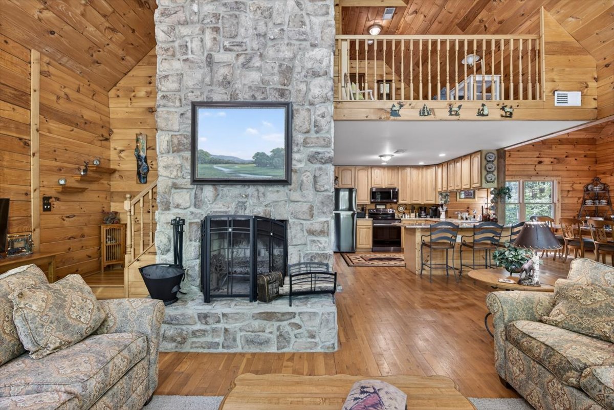 Kitchen, living room & loft in one view.