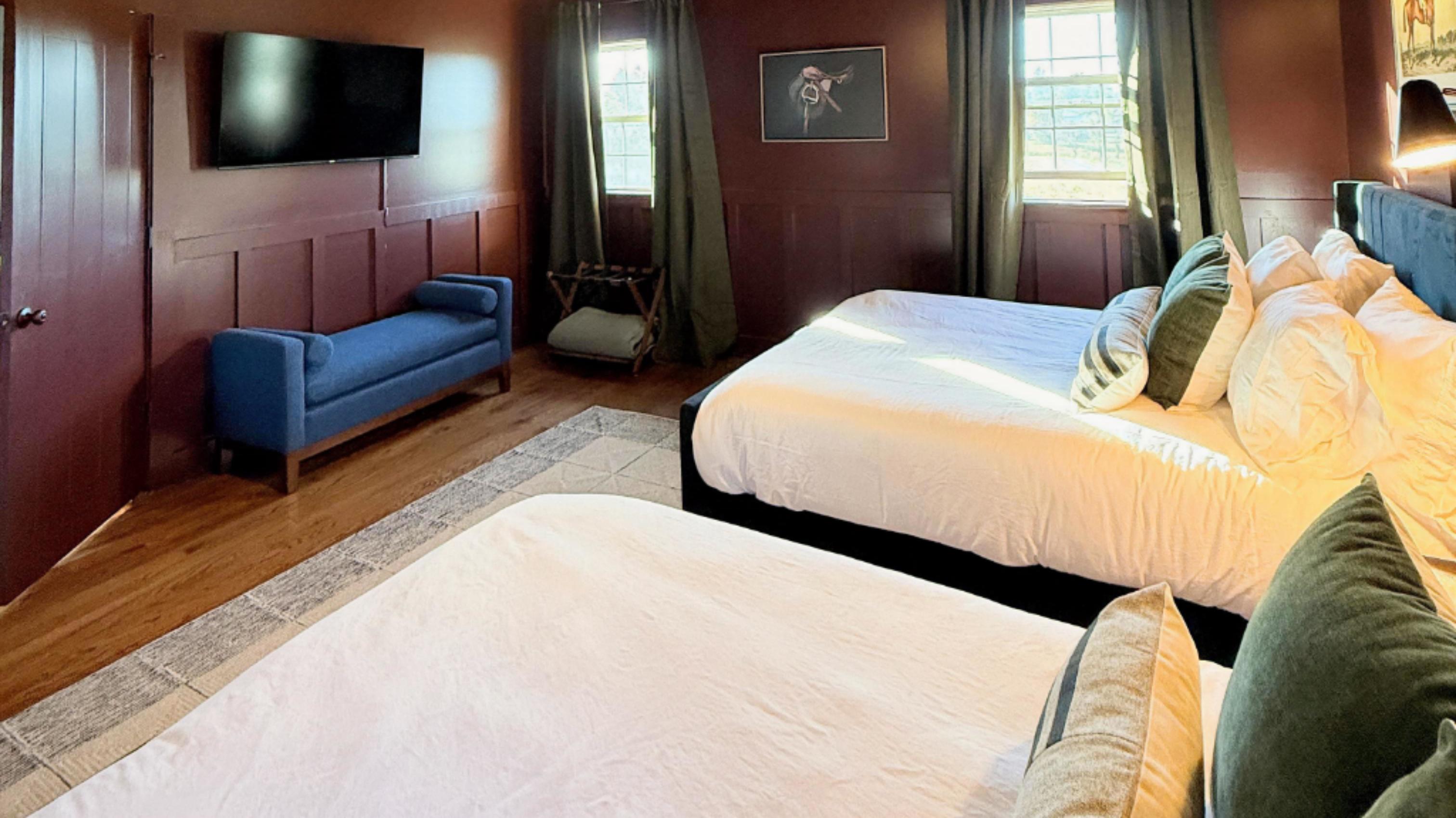 Classic charm meets contemporary comfort — soft lighting and tailored details create a welcoming space for conversation, reflection, or a quiet moment before the next day’s trail adventures.