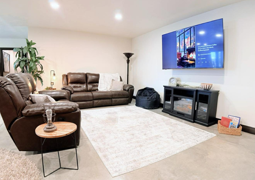 Closer look into the living room with electric fireplace.