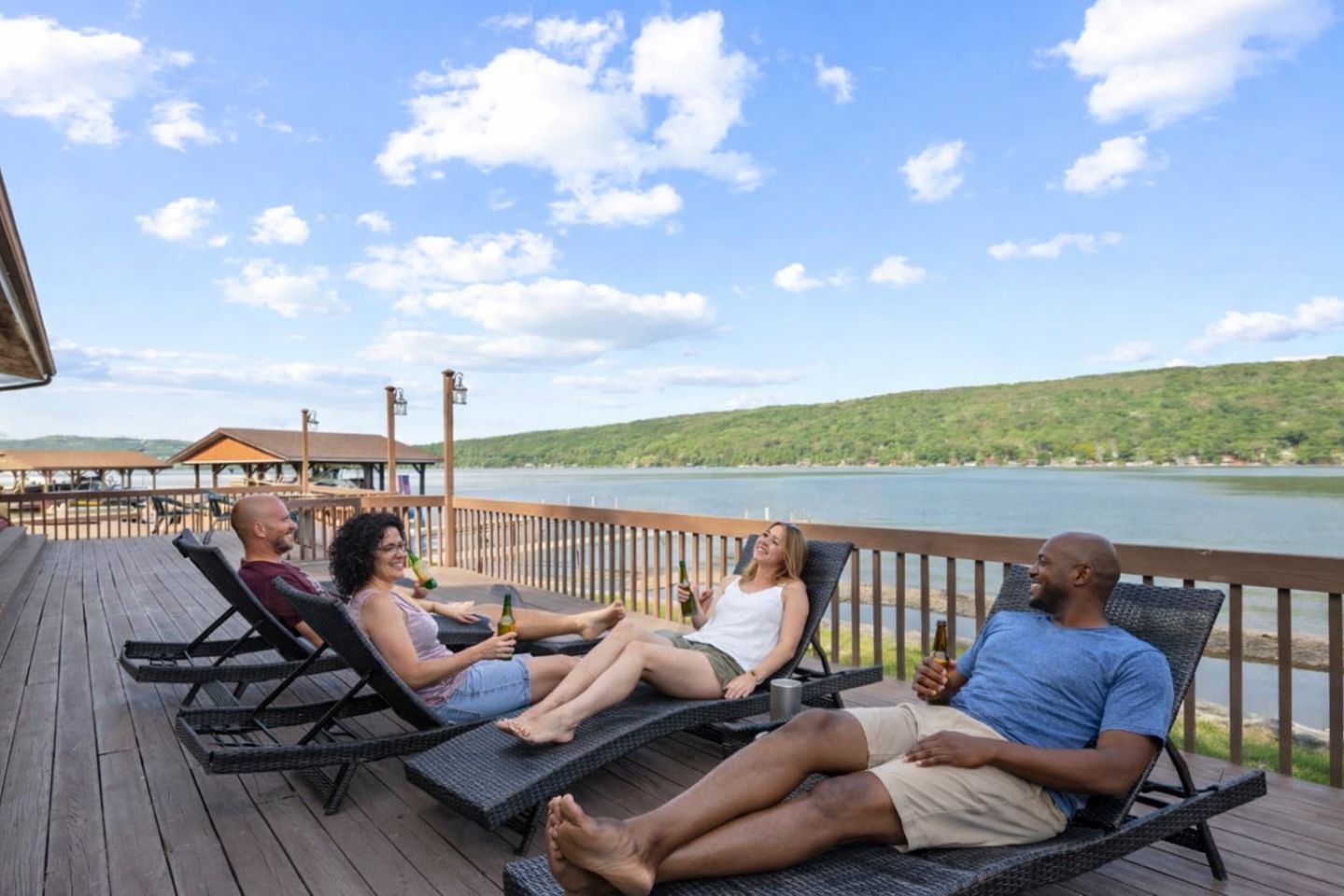 Lounge on the deck and enjoy the sounds of the lake and the views of the mountains