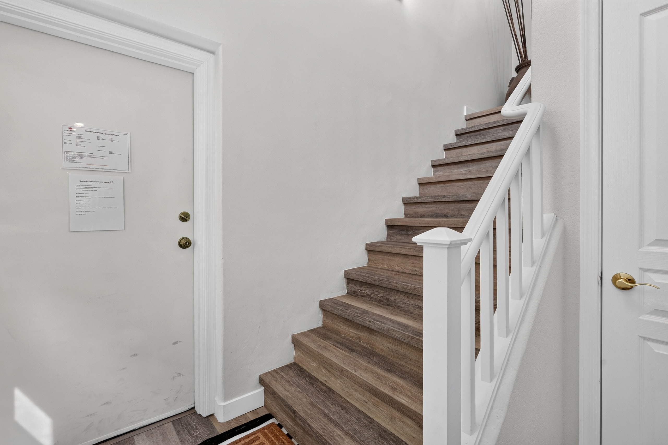 Stairway entry with interior access and a simple layout connecting to the upstairs rooms.
