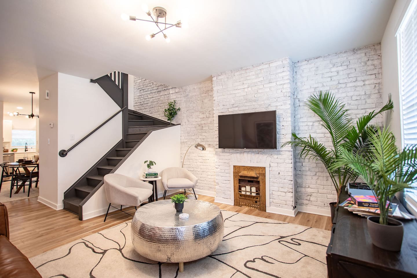 Bright and airy living room with a clean, white interior, creating a fresh and minimalist space that's perfect for relaxation and unwinding.