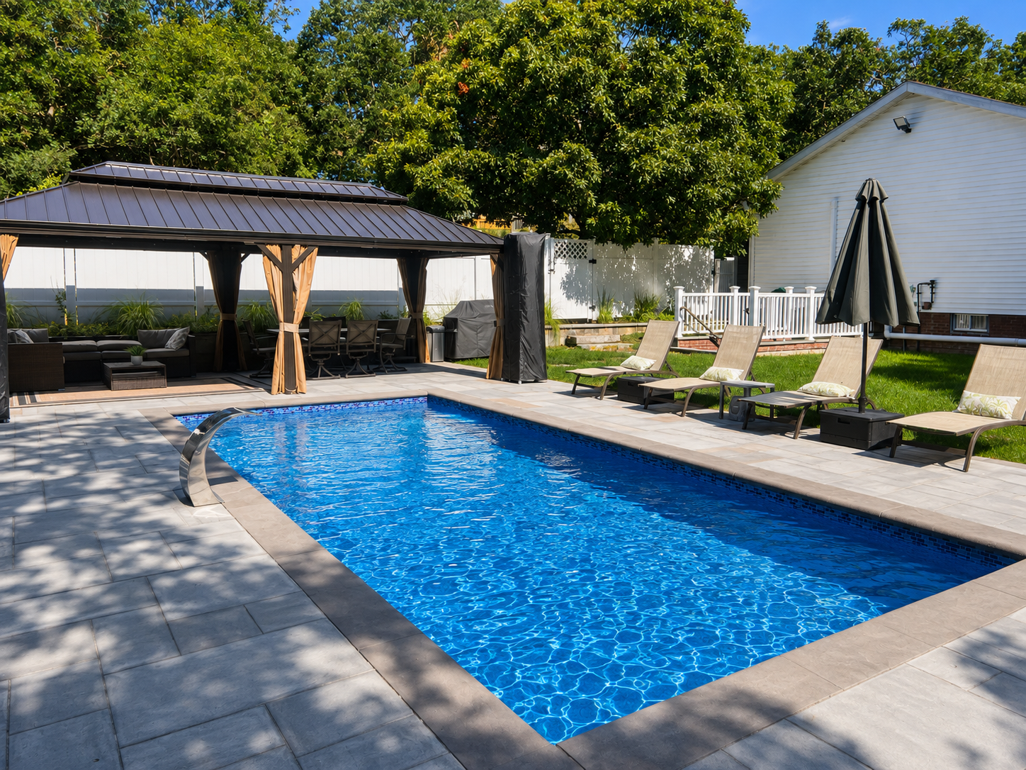 Private heated pool with covered gazebo lounge and sun loungers