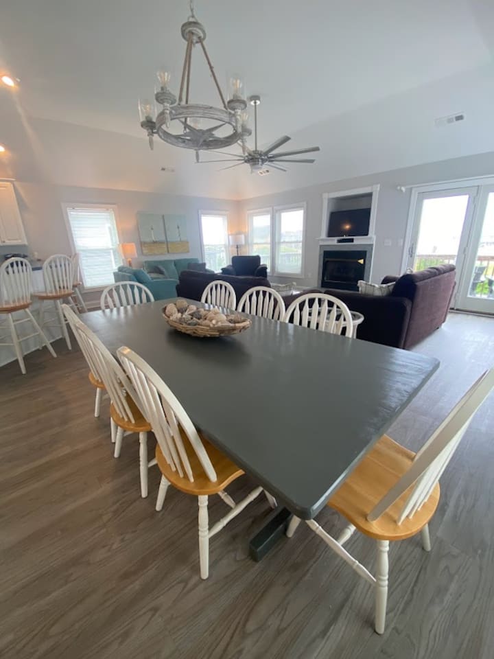 Gather around the spacious table for family meals!