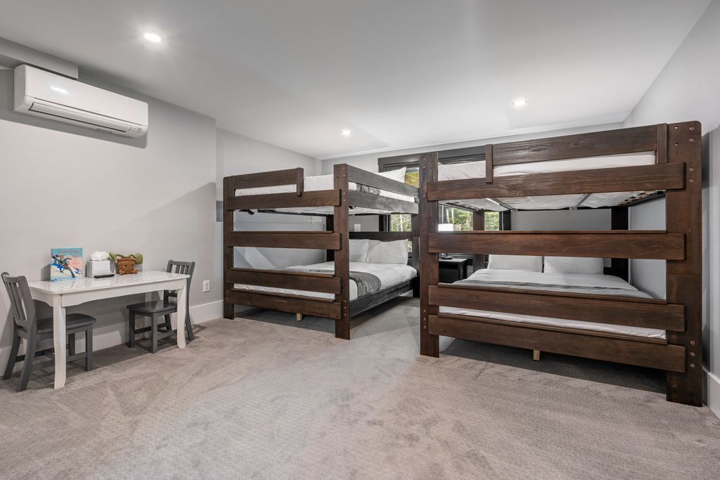 Basement bunk room bliss! Perfect for sleepovers and creating lasting memories.