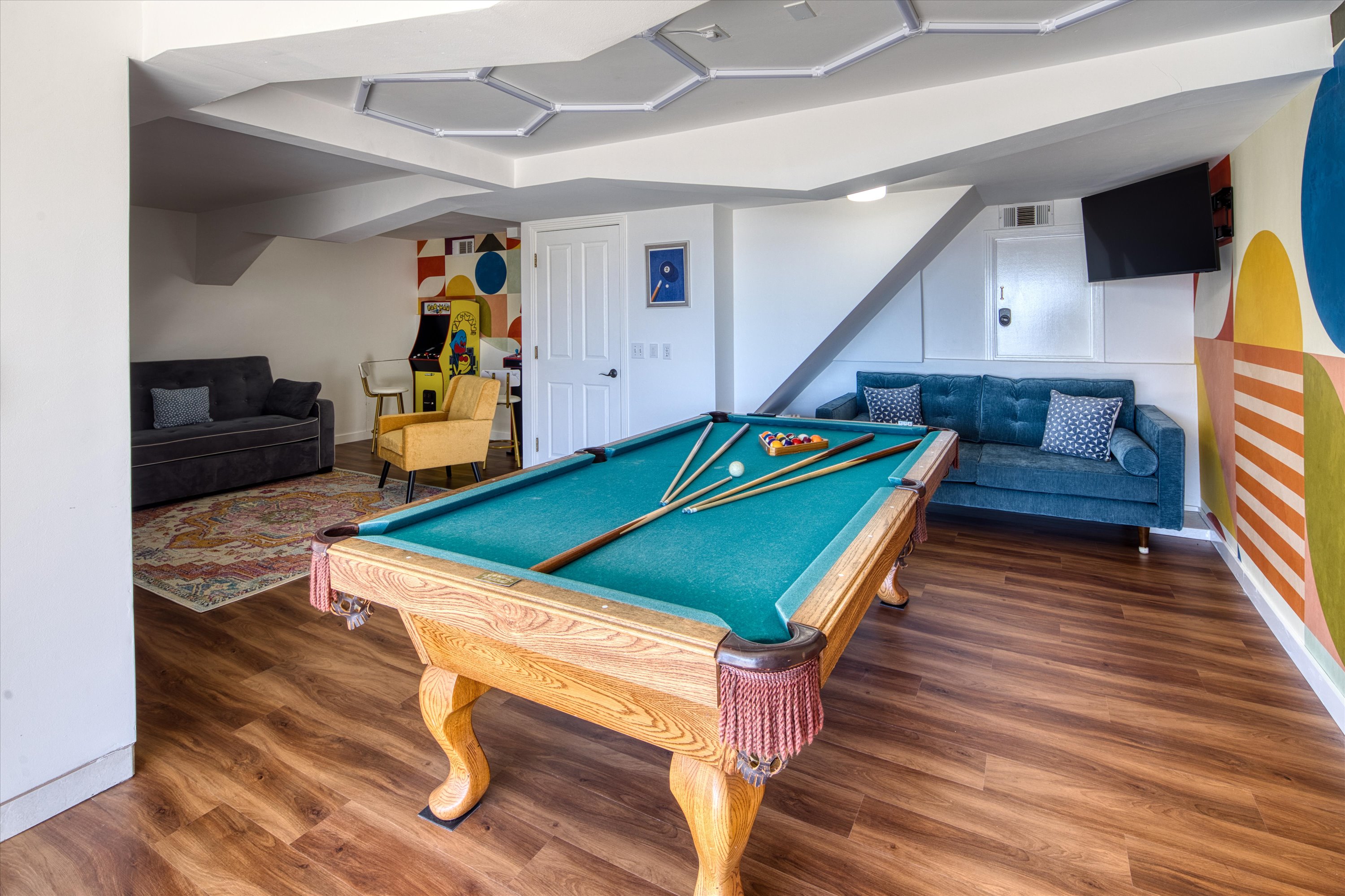 Your game-night headquarters—pool, big-screen sports, and plenty of room for friendly competition