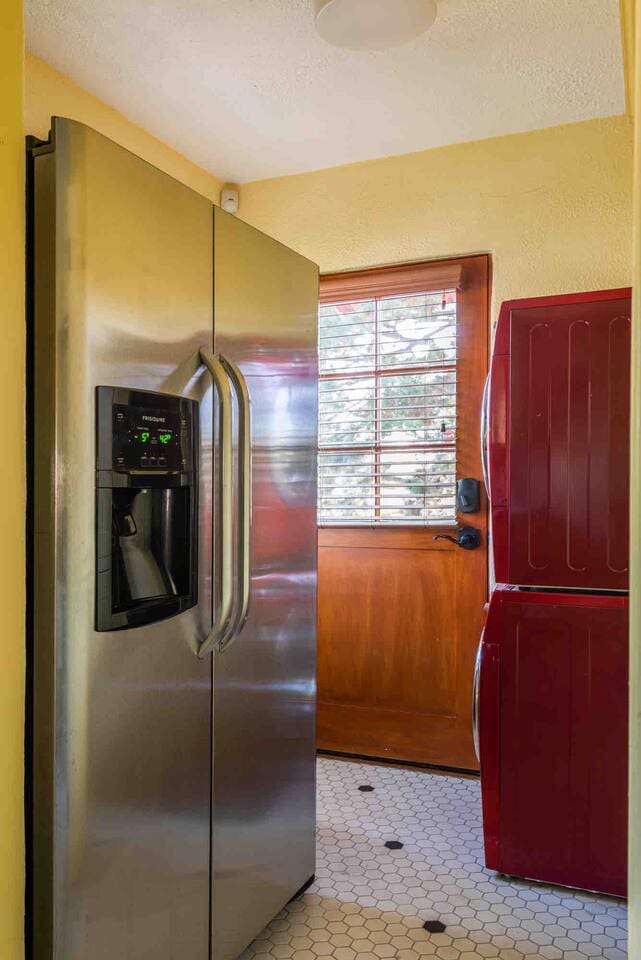 Full sized refrigerator with icemaker.