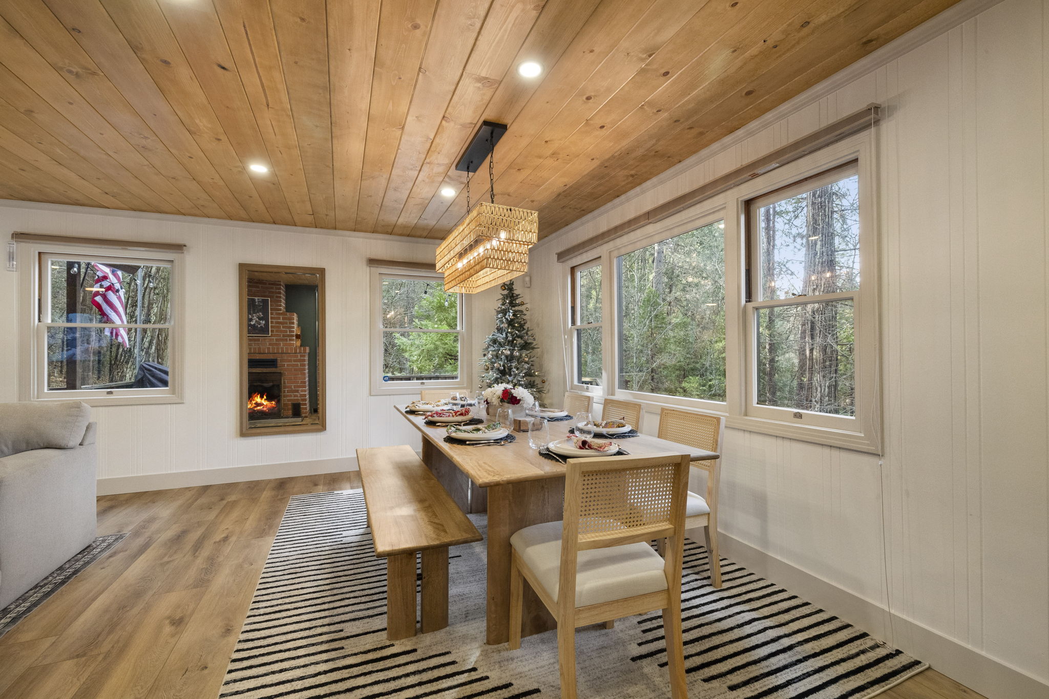 Dining table for up to 10. Up to 6 chairs and a large bench is available for seating. Plenty of dishes for your large groups as well. The most beautiful views to enjoy.