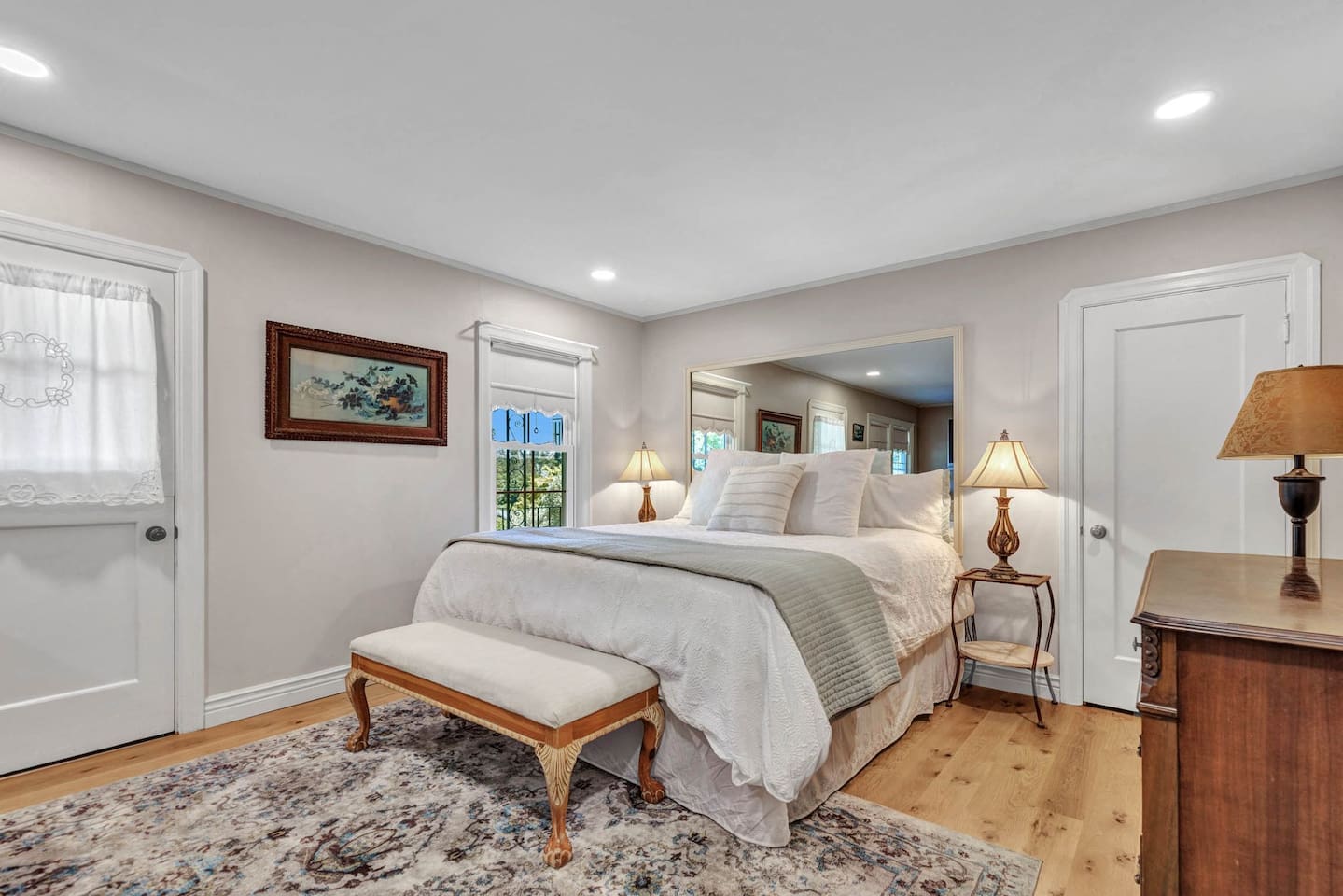 Bedroom on first floor, with private entrance, full bathroom and king bed. 