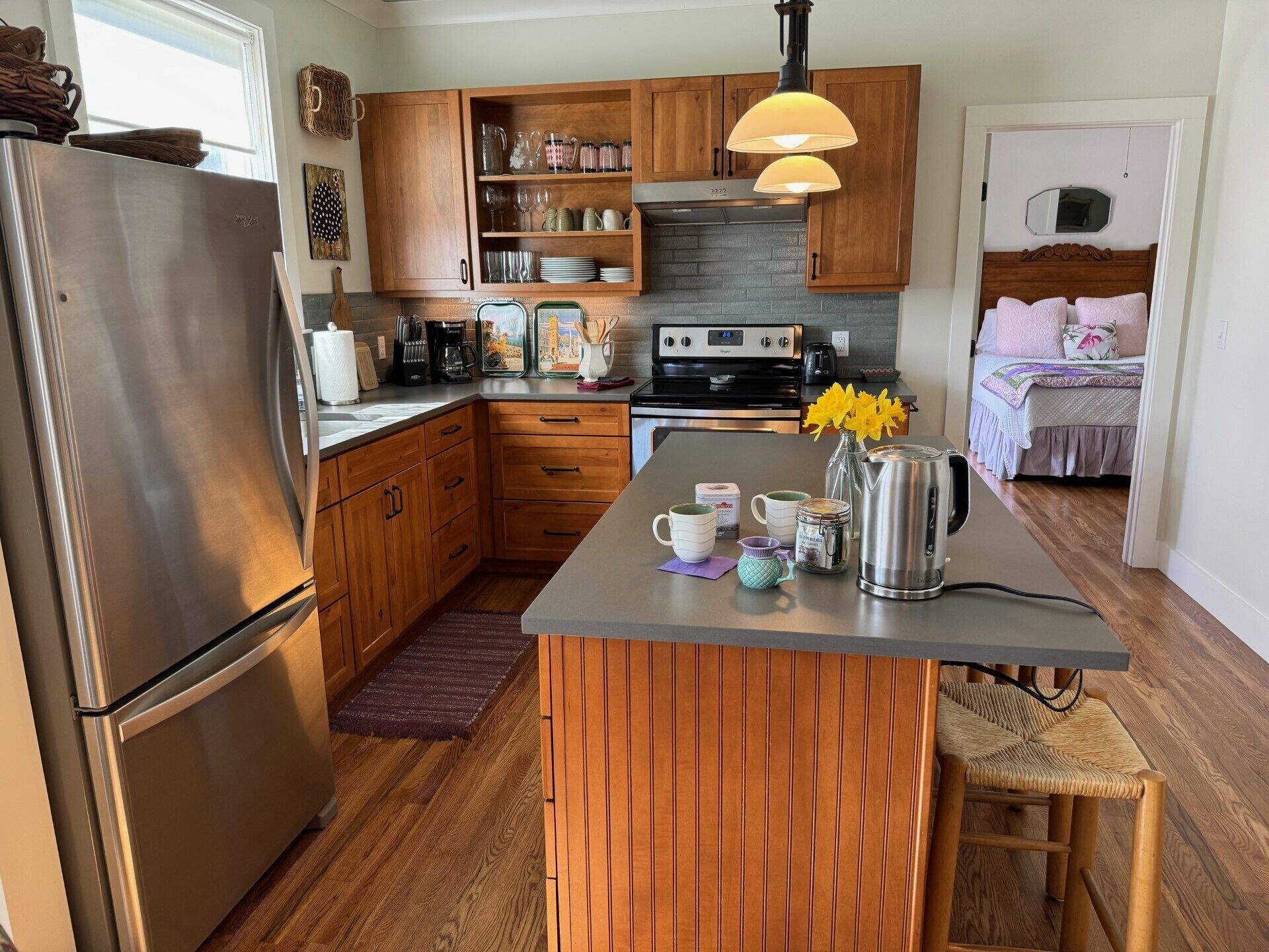 Tea, anyone? Custom kitchen with new appliances and many cooking accessories