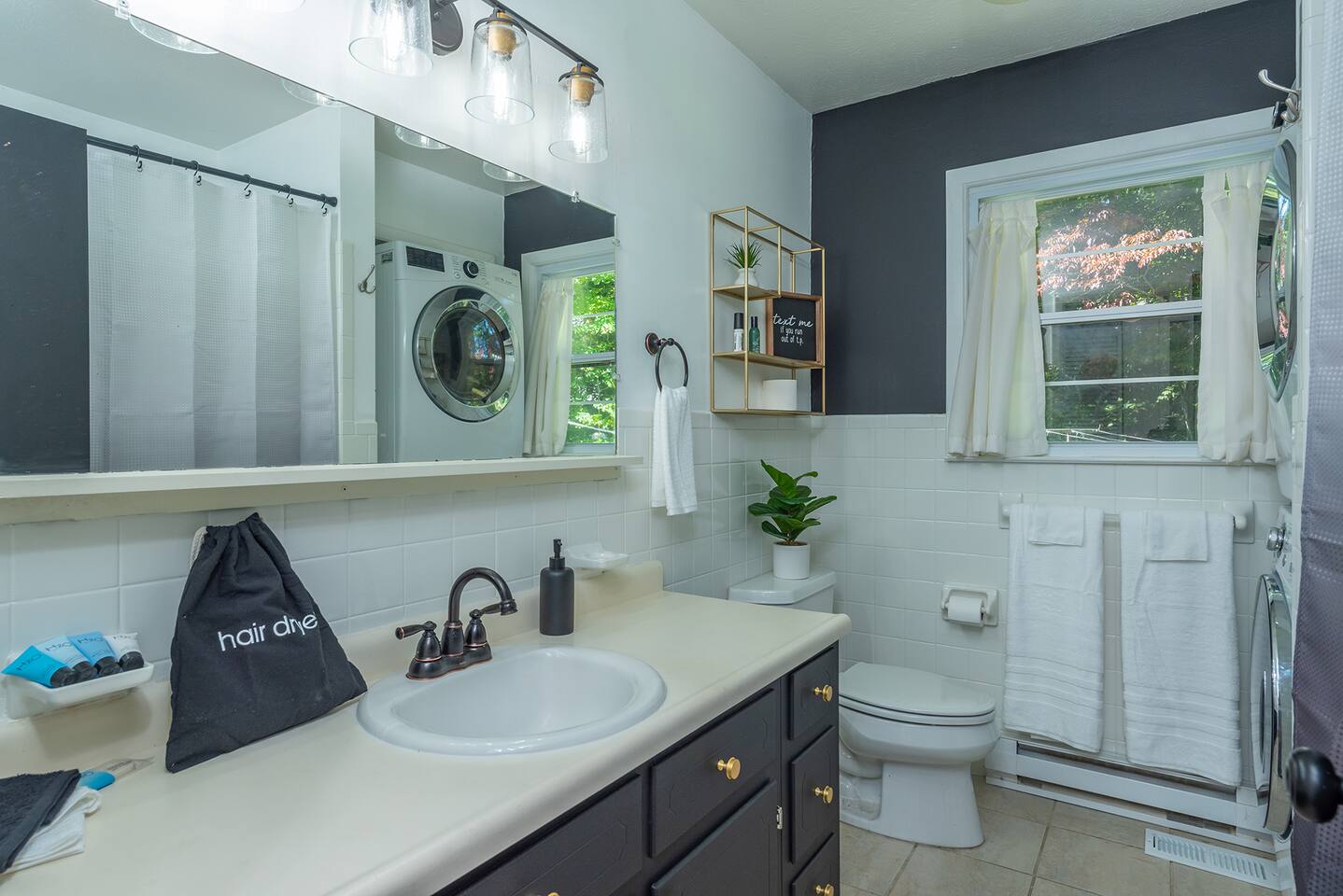 Full Bath off hall- Extra clean, hanging 1 large bath Towel,  bathmat located on back of door. Amenities: hair dryer shampoo, conditioner, body wash & lotion, 2  black wc 4 make up removal. TP, tissue FIRST AID KIT located under sink. C draws extras