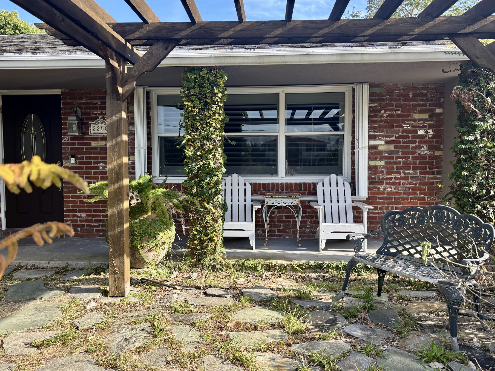 Enjoy time outside under the pergola, surrounded by a garden and fountains.