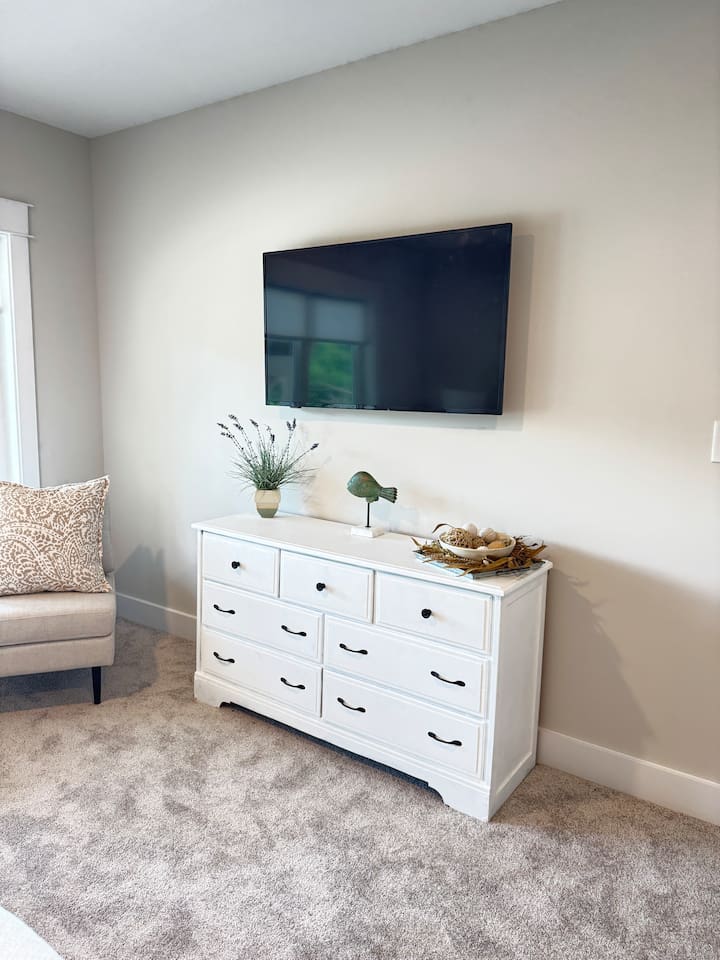 Every element of this room is thoughtfully curated with sweet details that seamlessly tie together the color palette that create a harmonious and inviting retreat!
