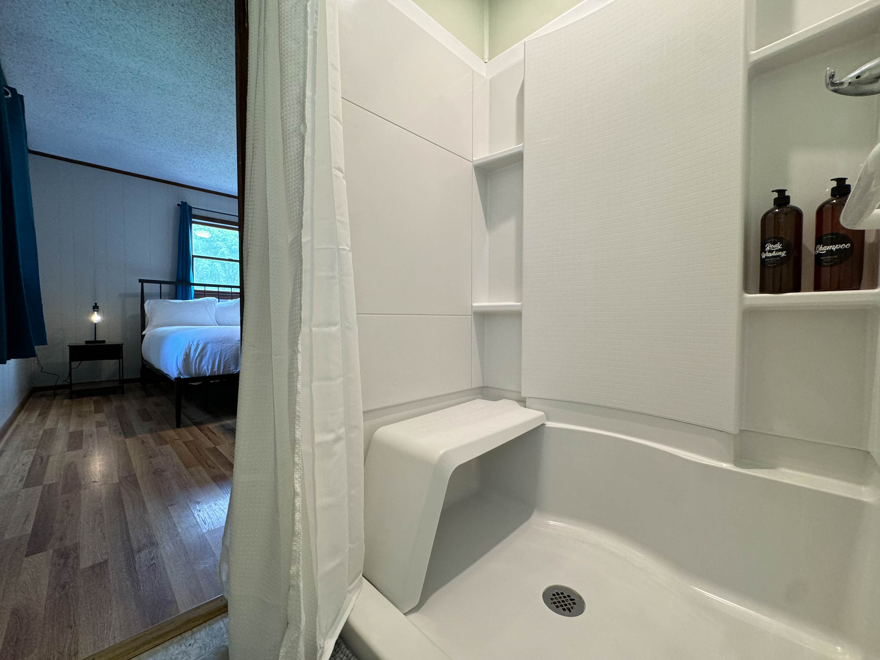 built in shower bench in the master ensuite bathroom.
