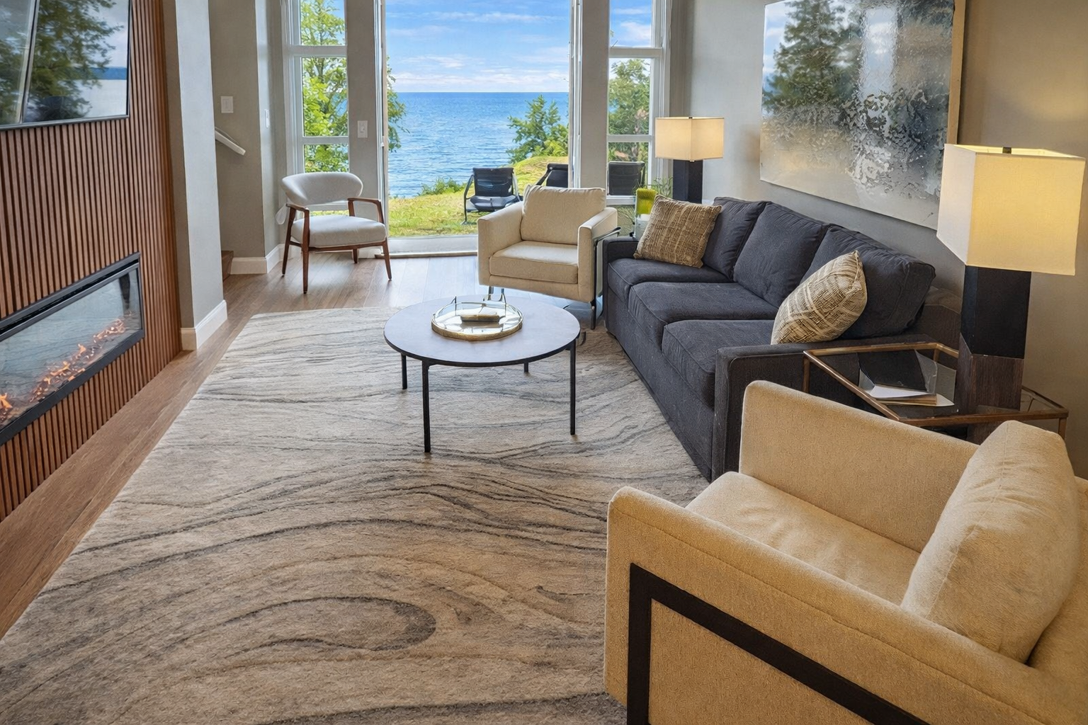 Magnificent view from dining area thru living room to outside with ocean as your backdrop. Streaming TV in living room. Gas fireplace. Central AC as well.