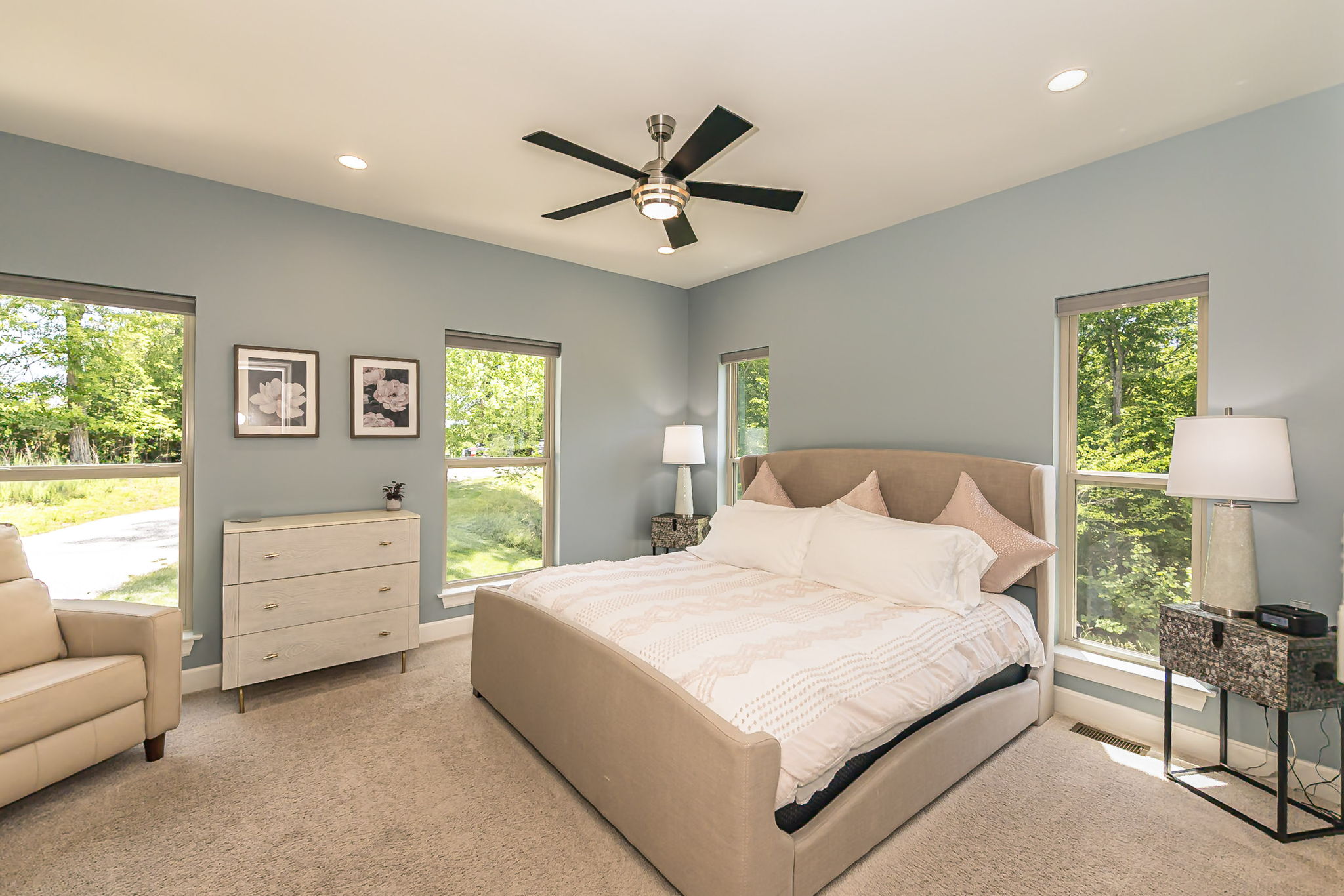 Second king bedroom on main level with comfortable furnishings.
