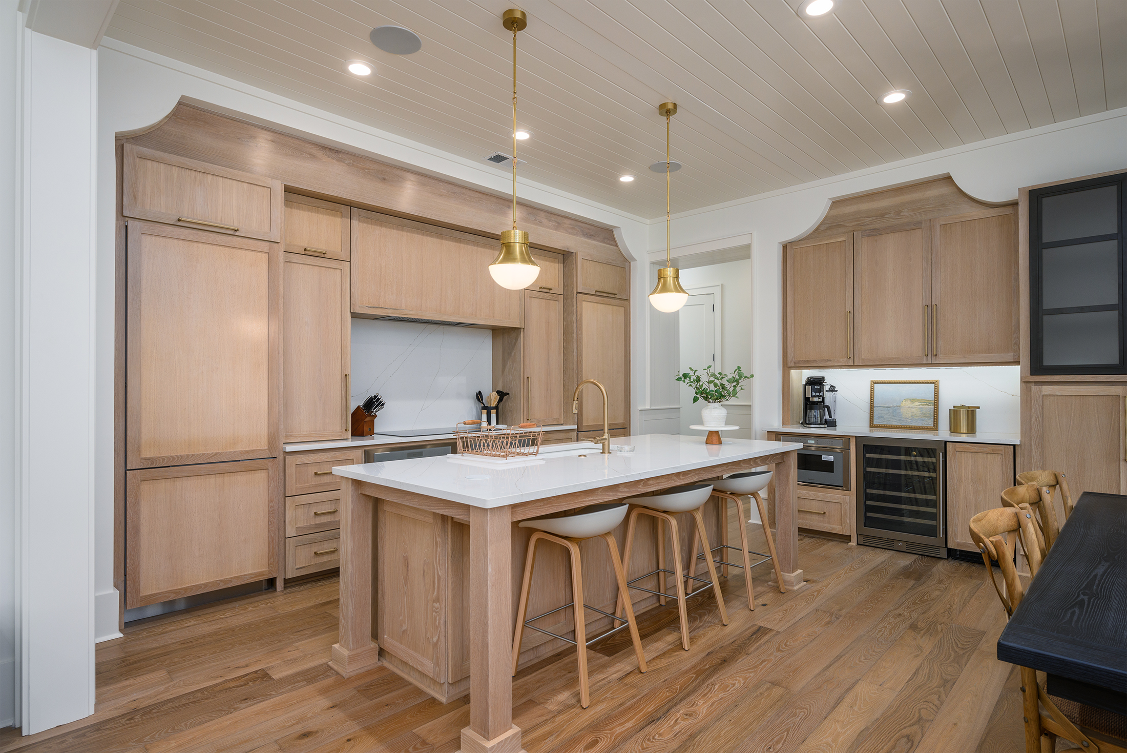 Kitchen features a coffee bar and wine fridge
