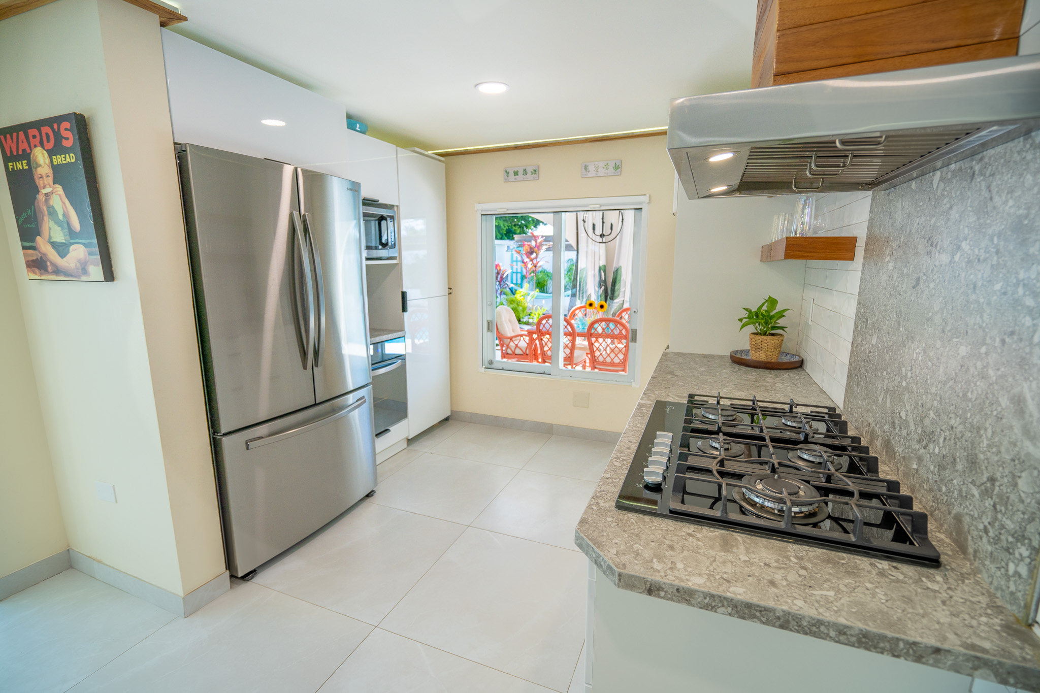 This view showcases our french door fridge, microwave, and convection oven in Dorado, Puerto Rico.