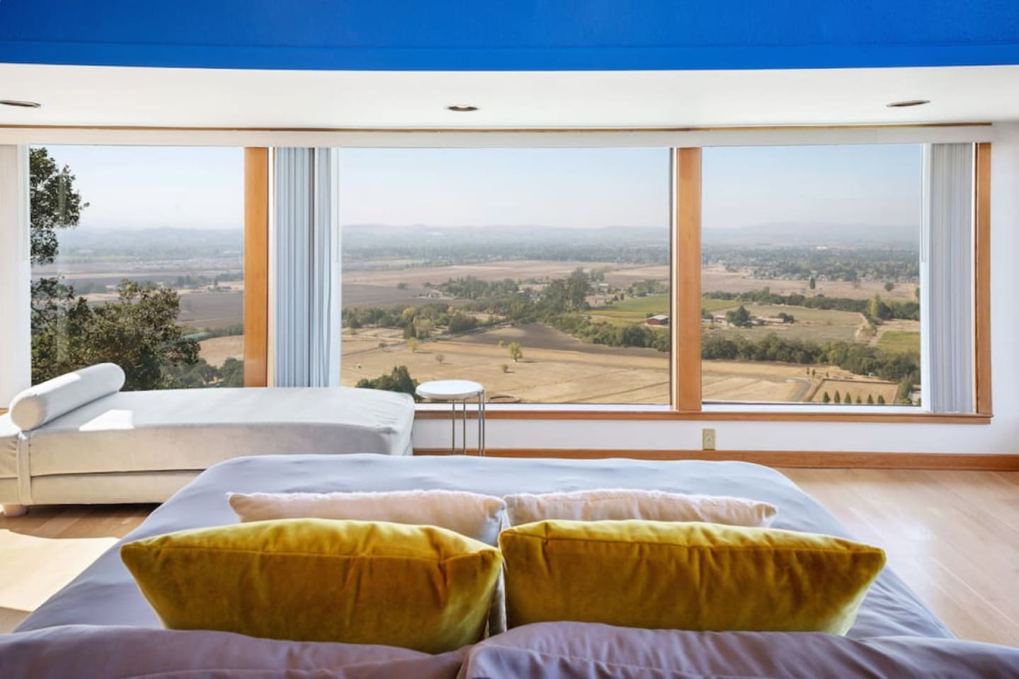 The primary bedroom suite is by itself on the top floor of the house. The views are incredible. We highly recommend leaving the blinds open all night so you fall asleep to the city lights and wake up to this view.