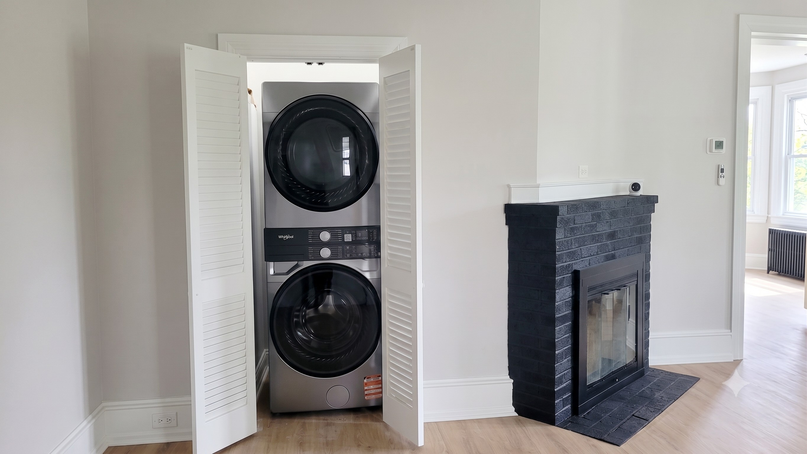 Real wood fireplace and in-unit laundry provide all the conveniences of home.