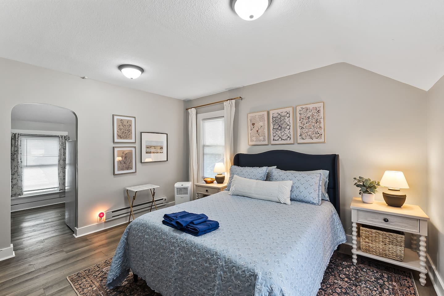 Plenty of natural light and easy flow make this bedroom a relaxing home base for your stay.