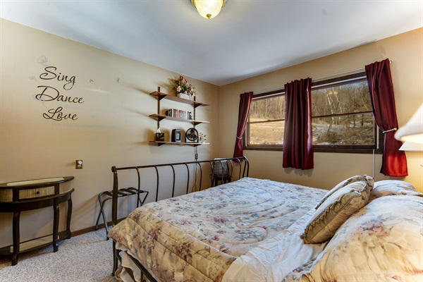 The Florentine Lounge features a king bed and a great collection of Patricia Cornwell mysteries!