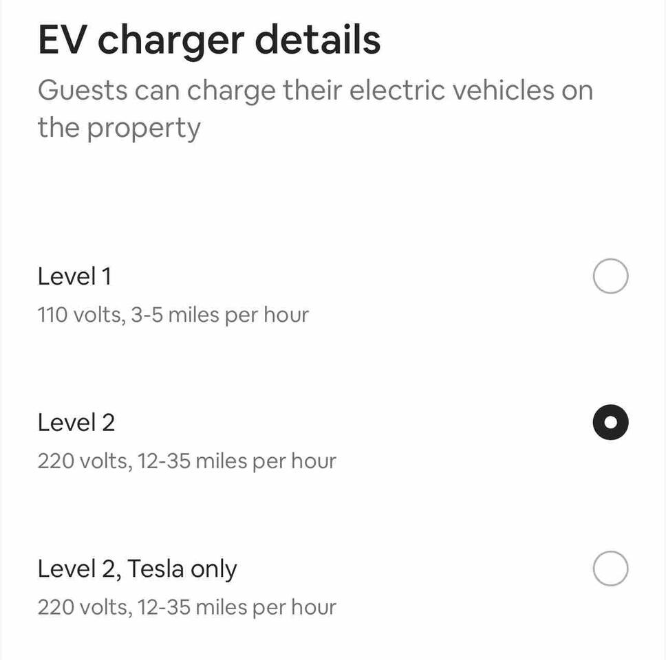 In the garage - this home has a standard J1772 plug for home charging. This charging station provides juice to an onboard charger rated at 11.5 kW to add 25 to 30 miles of range in an hour.