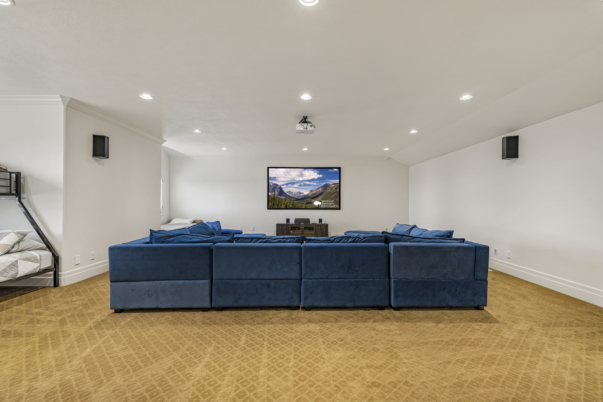 Spacious theater lounge for movie nights, family fun, and unforgettable memories.