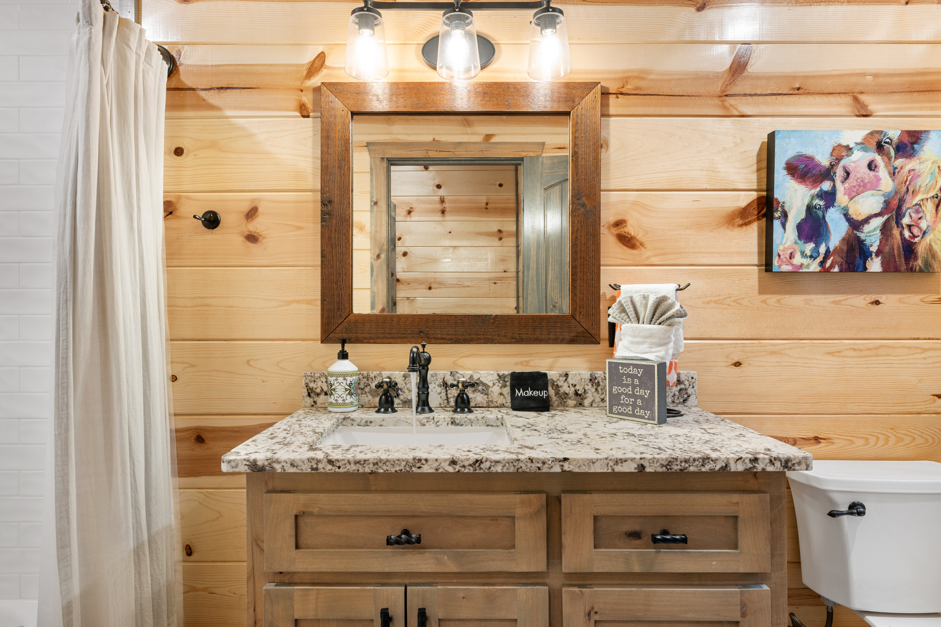 Rustic bathroom vanity with charming cabin-inspired details