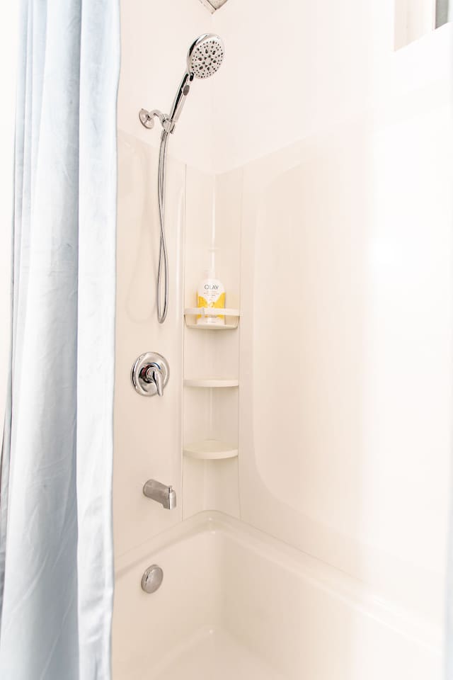 Full bathroom with modern fixtures and a clean, contemporary design.