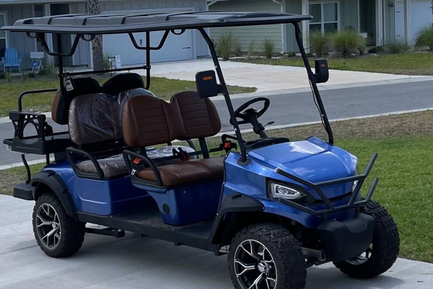 Stylish 6-seat golf cart offering comfort, convenience, and performance.