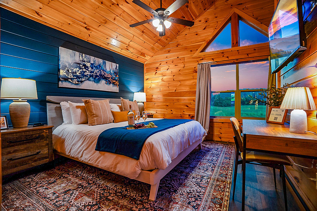 Deluxe master with cathedral ceilings and a view of the mountains