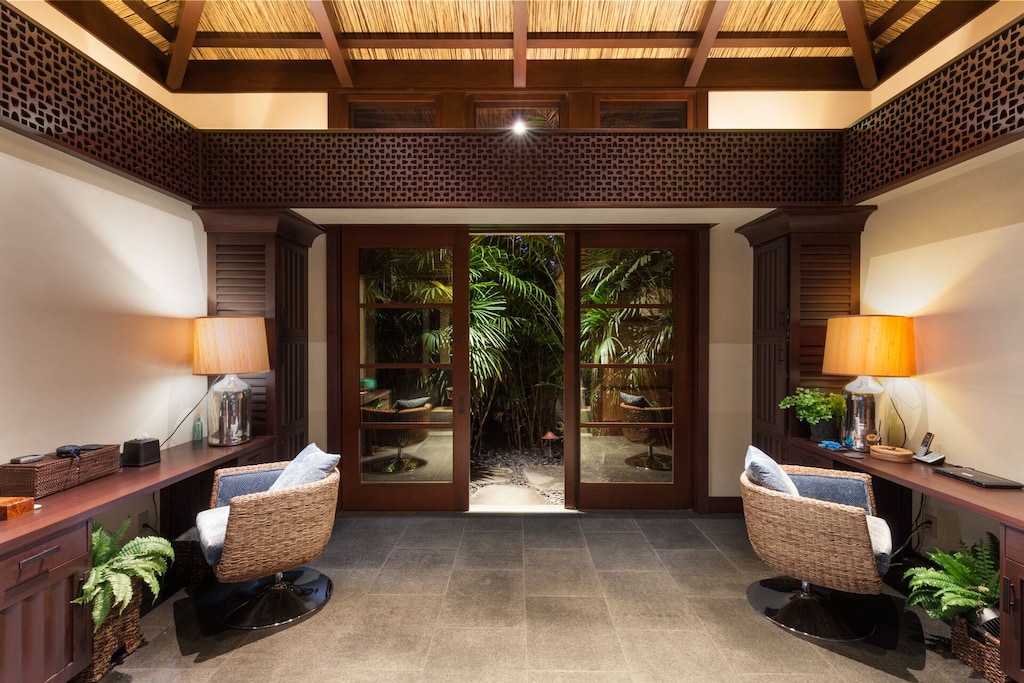 Office features a pull out sofa in front of the sliding glass doors