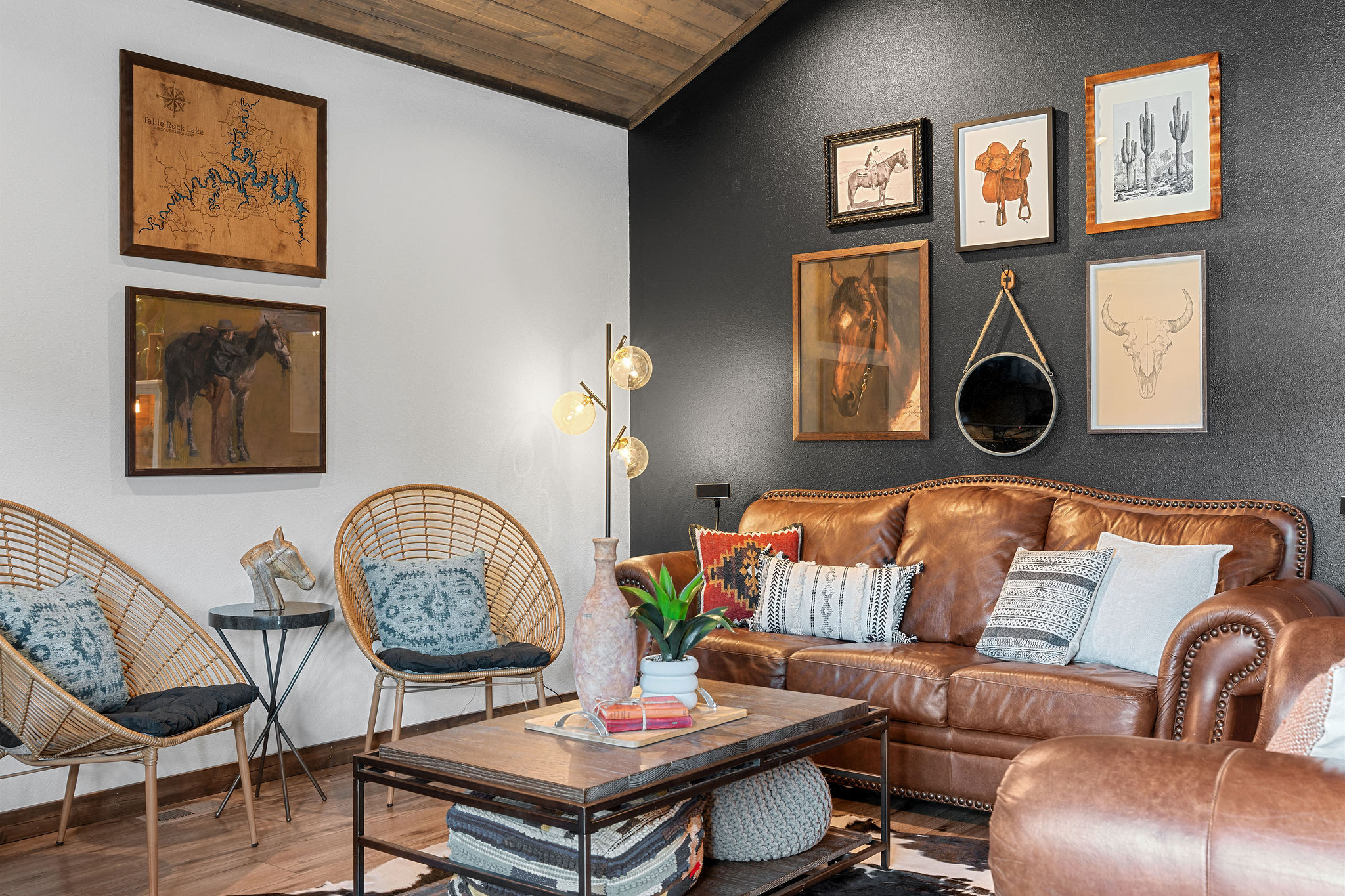 Warm, western-inspired living room with leather seating perfect for relaxing after a day at the lake 