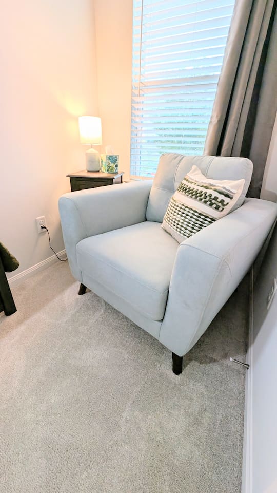 Curl up with a good book in this lovely nook.