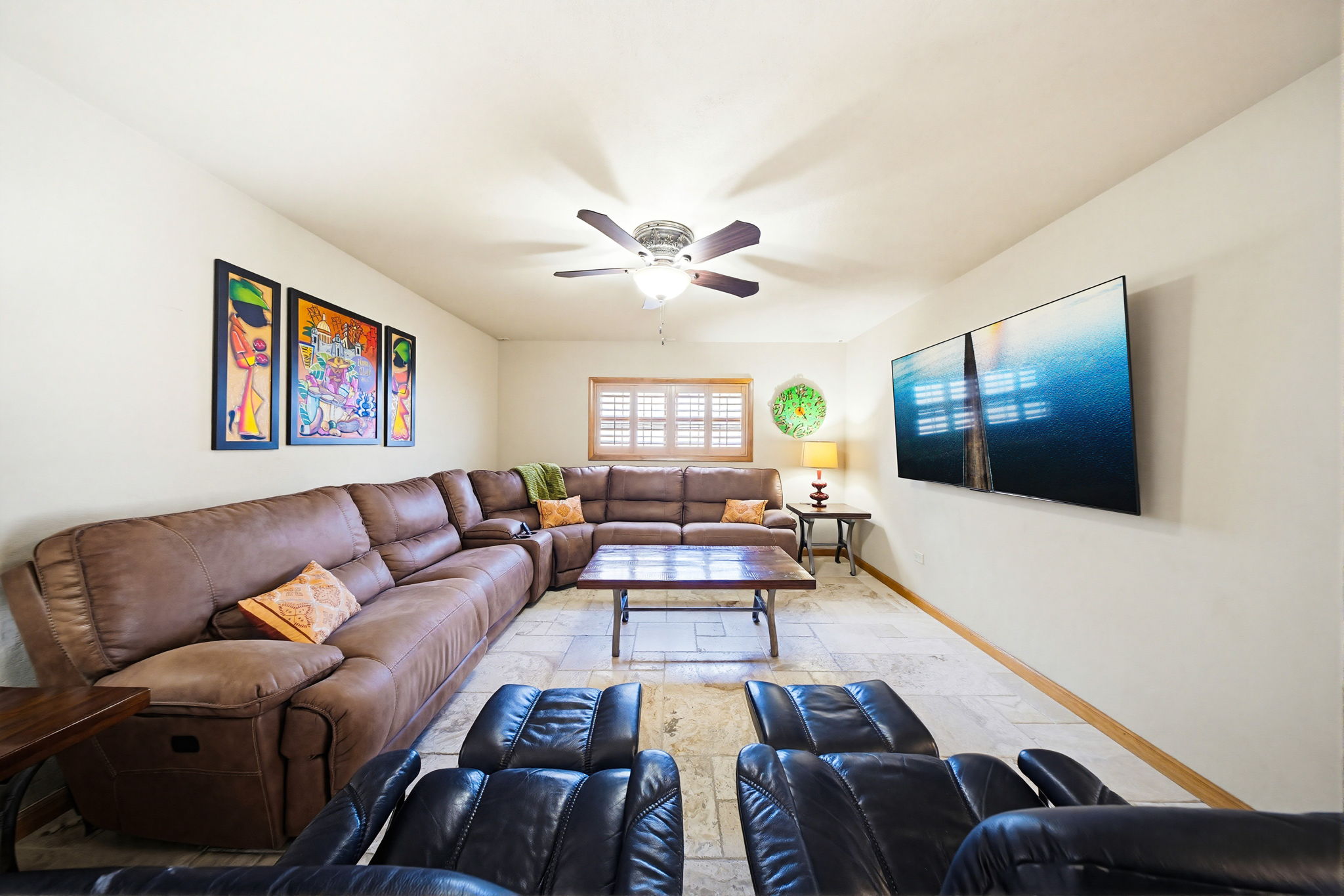 Enjoy the large 75" living room TV.