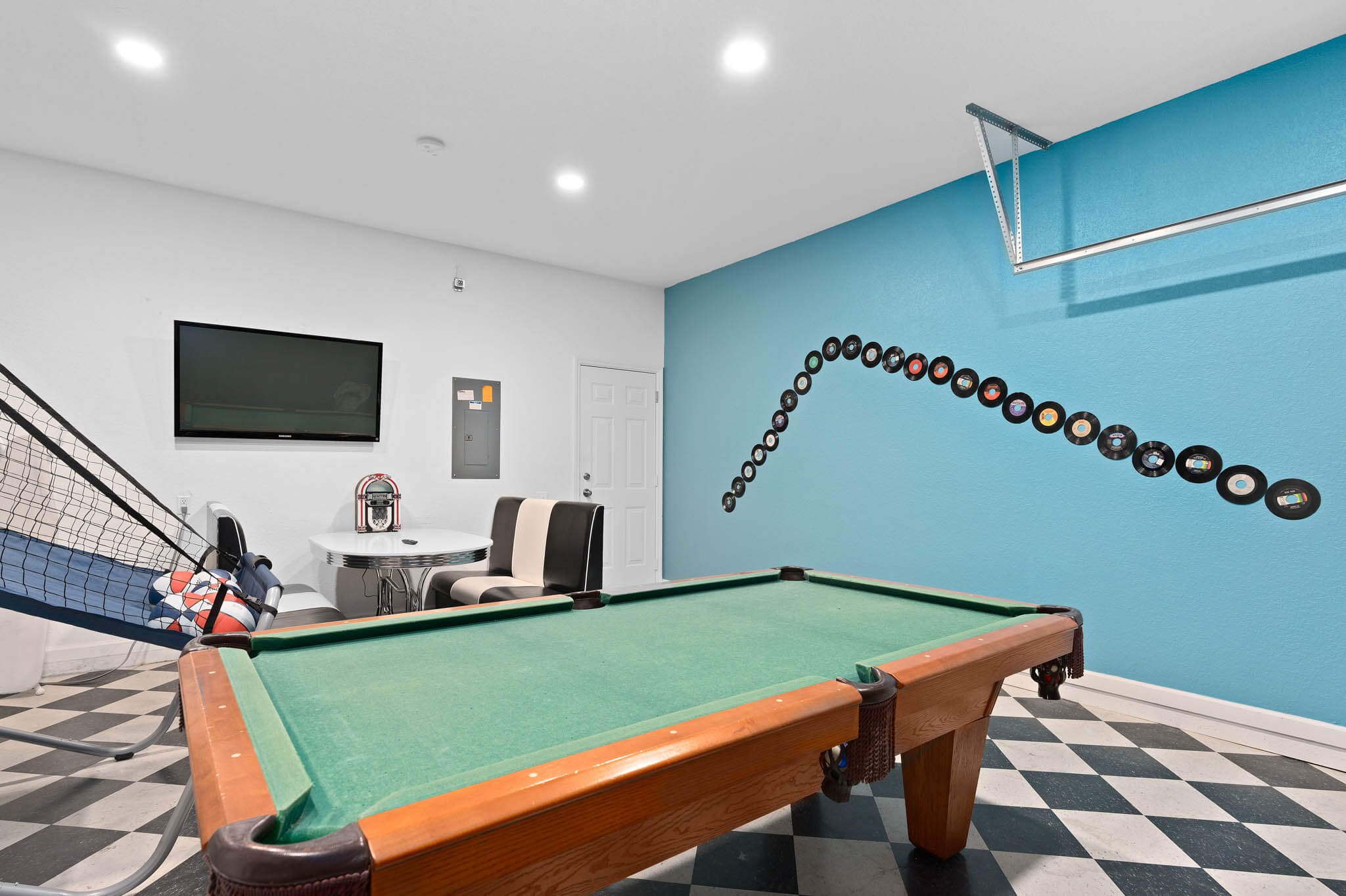 Gameroom with foosball, pool table, and basketball hoops game