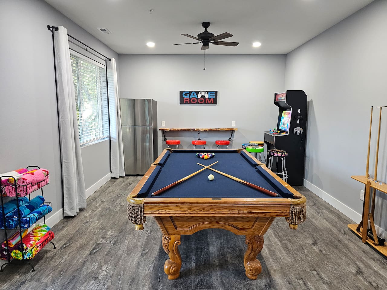 Game room with pool table for friendly family competition.